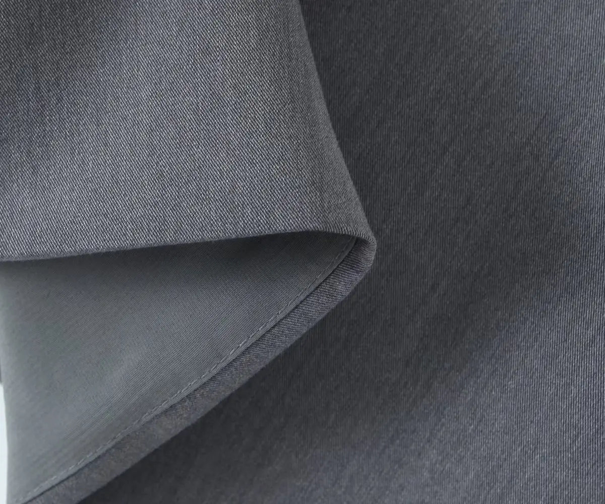 gray::Close-up of gray fabric with a slight texture