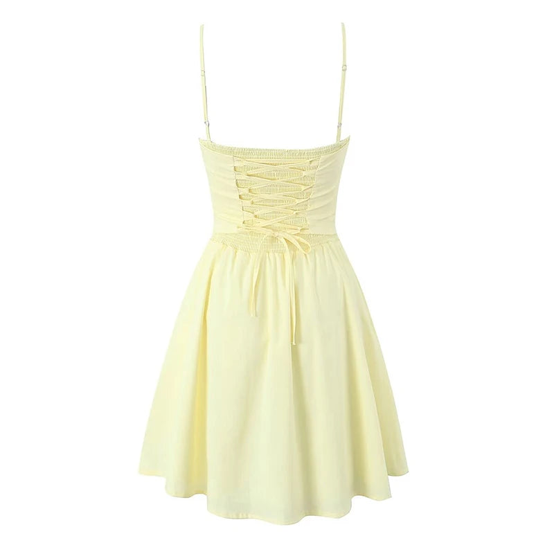 allvariant::Light yellow dress with thin straps on a white background