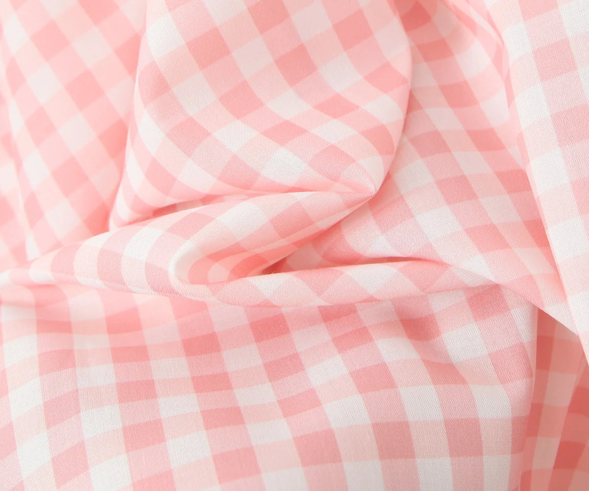 pink::Pink and white checkered fabric