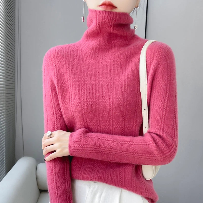 allvariants:: Person wearing a pink turtleneck sweater with a neutral background