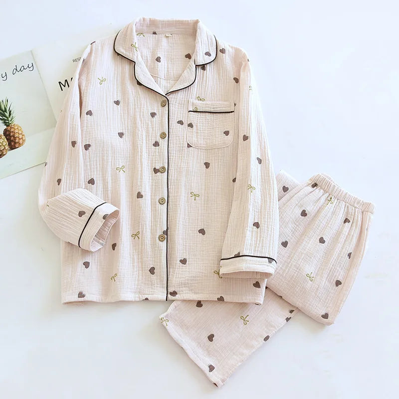 allvariants:: Beige pajama set with heart patterns on a light blue background