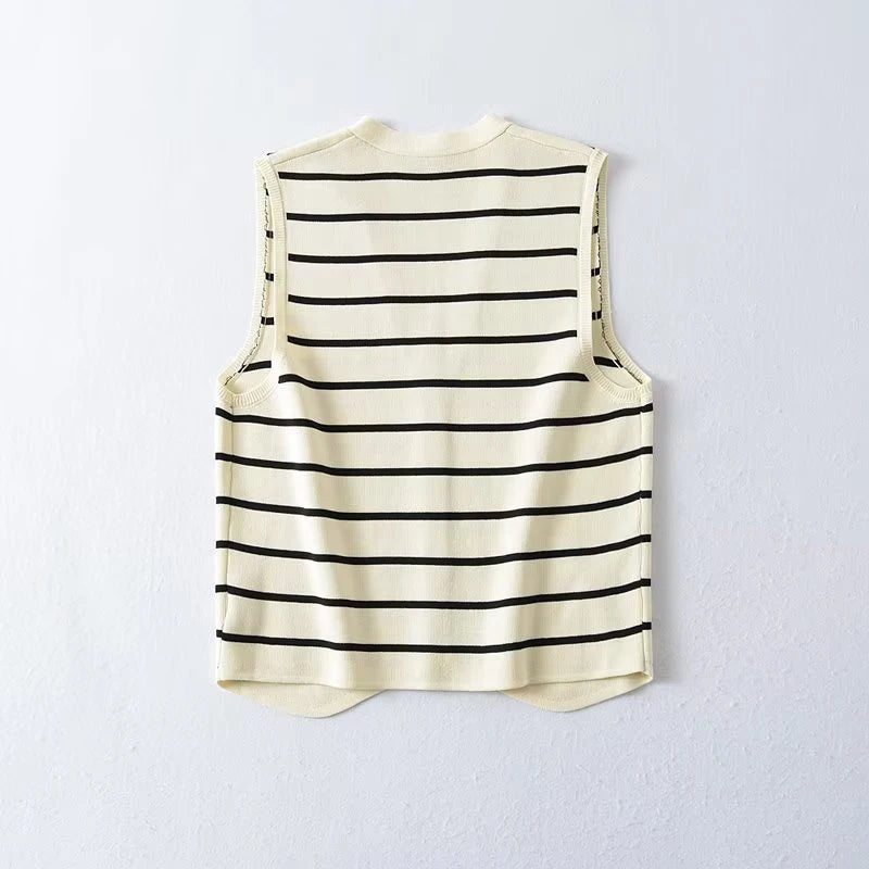 Striped:: sleeveless top on a light gray background