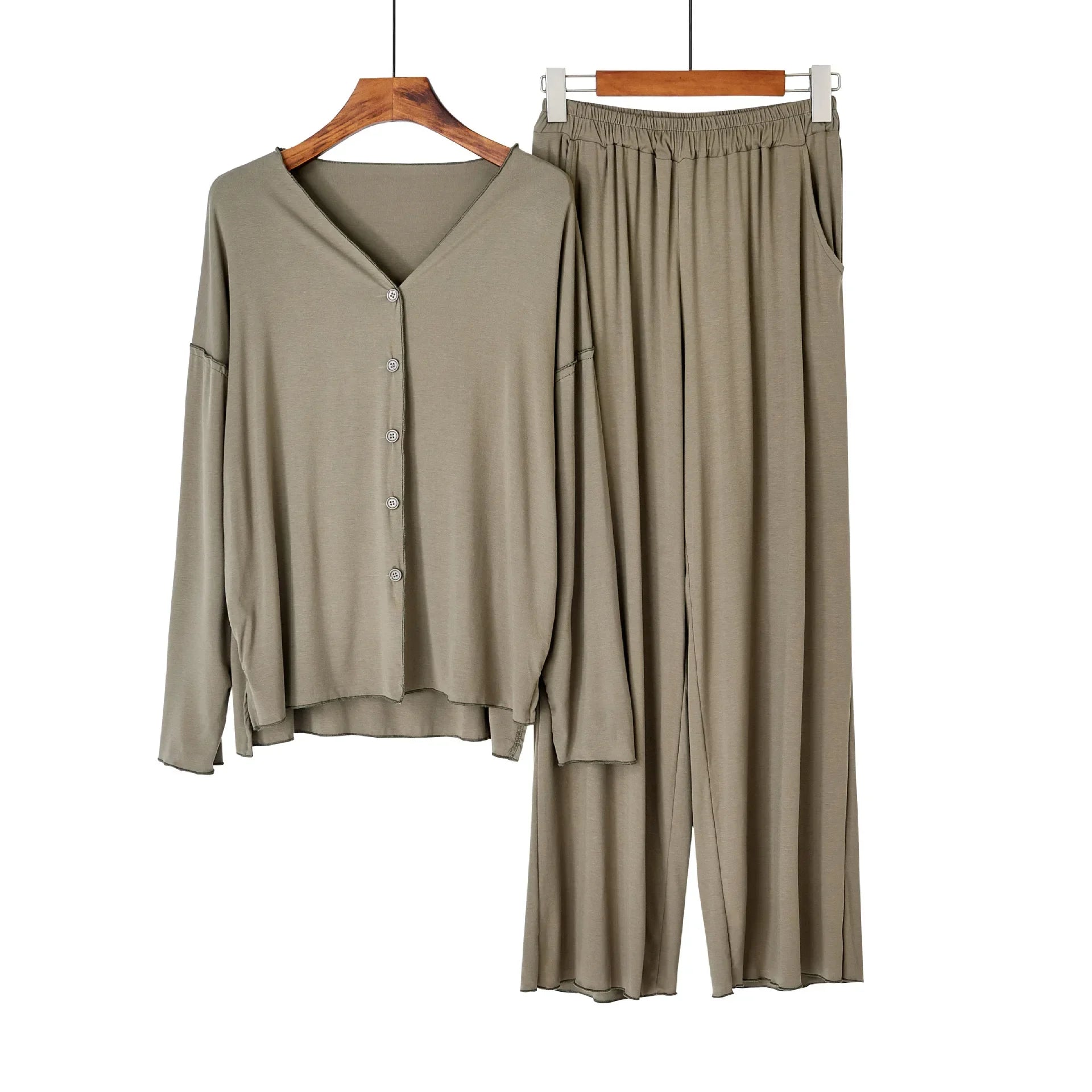 allvariants:: Khaki long-sleeve top and wide-leg pants on hangers against a white background