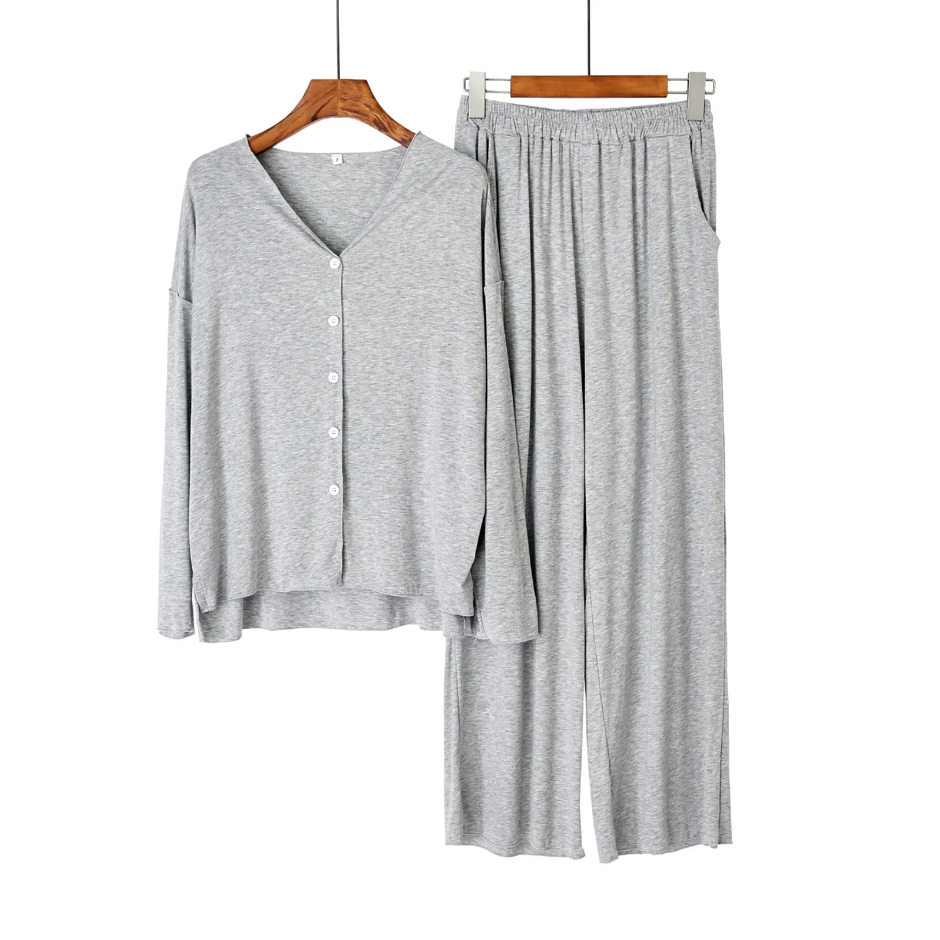 allvariants:: Gray cardigan and pants set on hangers against a white background
