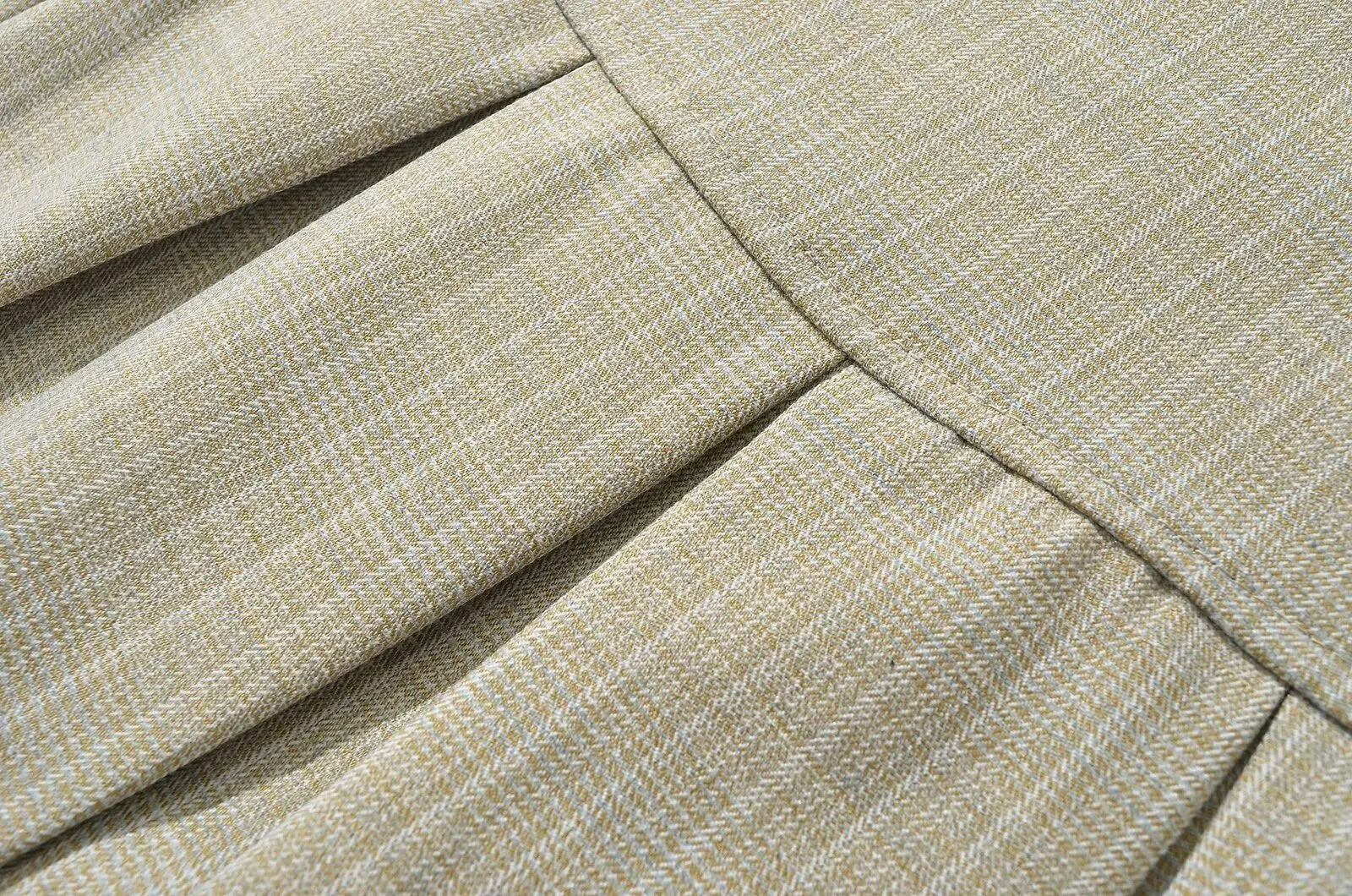 allvariant::Close-up of beige fabric with a textured pattern