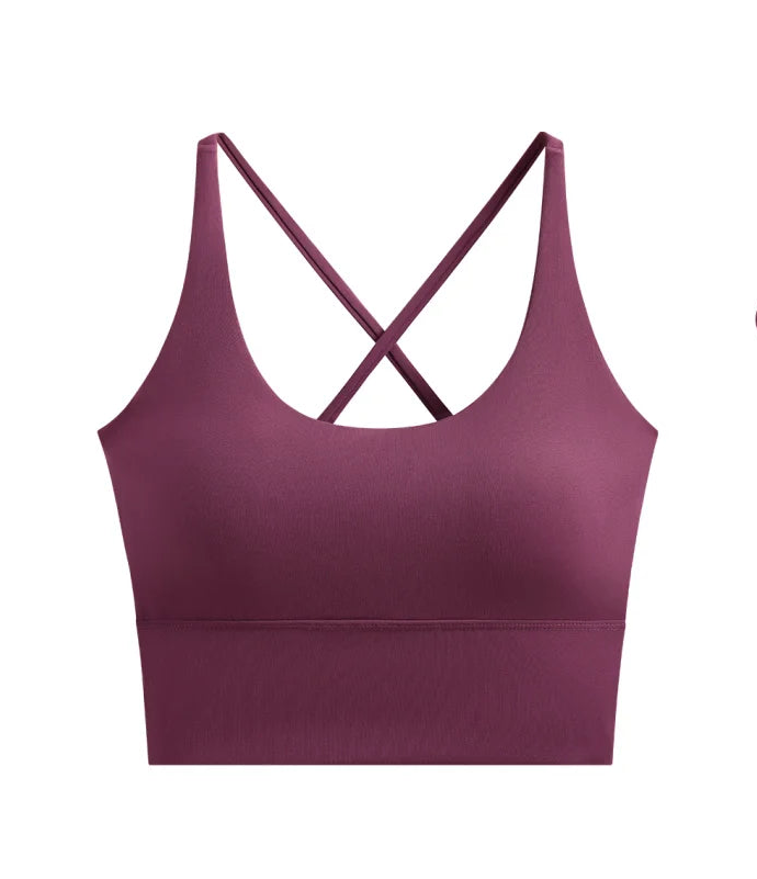 allvariants:: Maroon sports bra with criss-cross straps on a white background, featuring the brand 'CORE'.