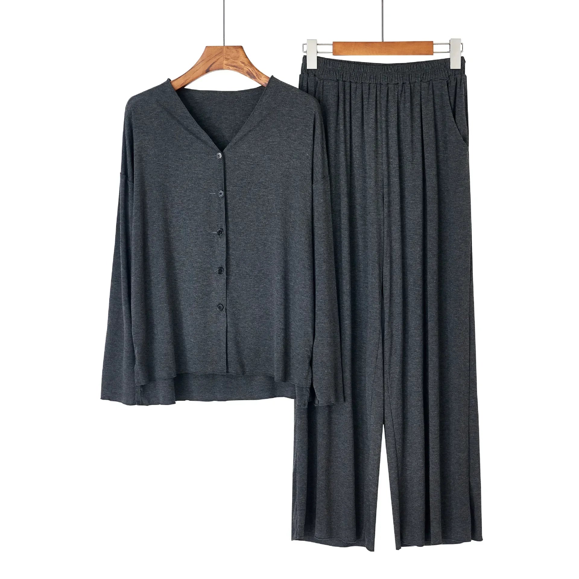 allvariants:: Dark gray cardigan and pants set on hangers against a white background
