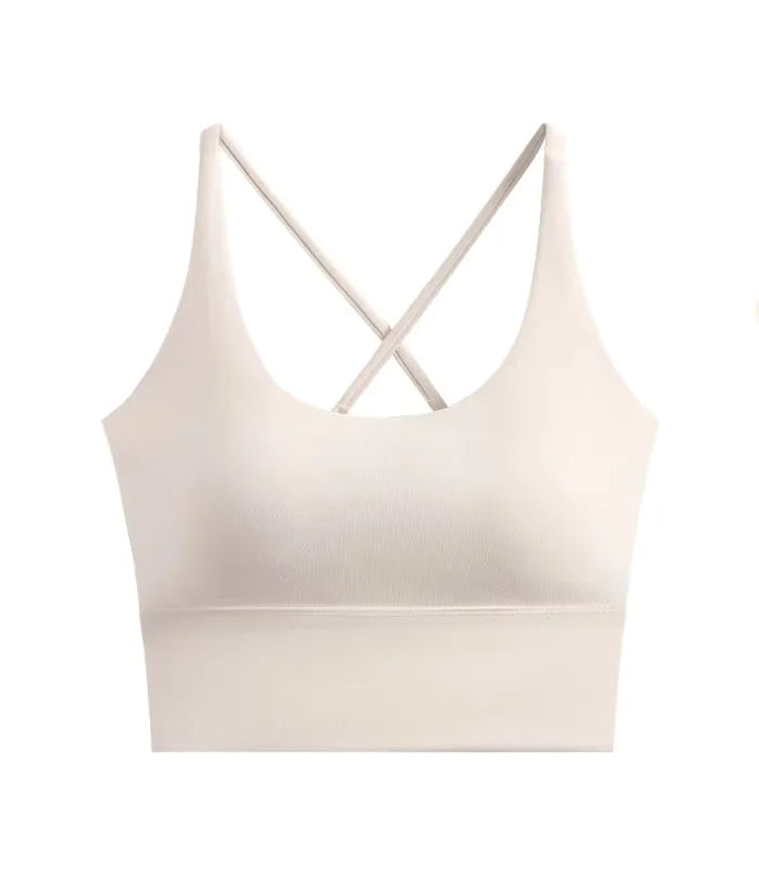 allvariants:: Beige sports bra with criss-cross straps on a white background