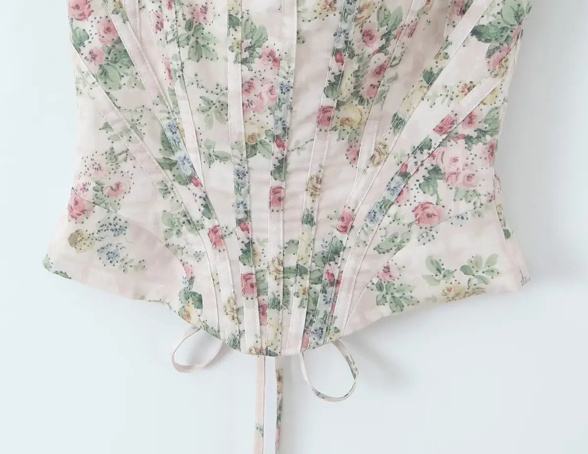 cream::Floral-patterned corset on a white background