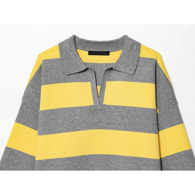 stripped::Gray and yellow striped sweater on a white background