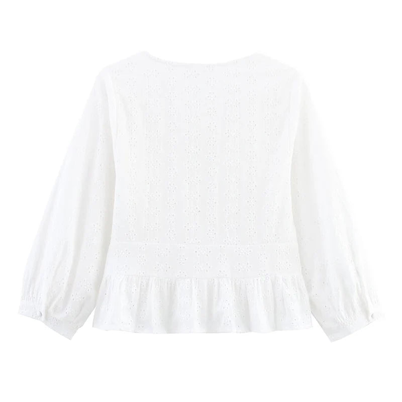 White:: blouse with long sleeves on a white background