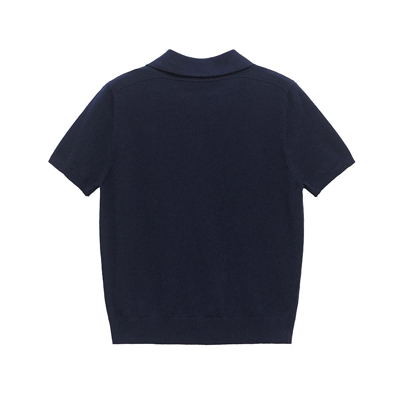 Navy blue:: polo shirt on a white background