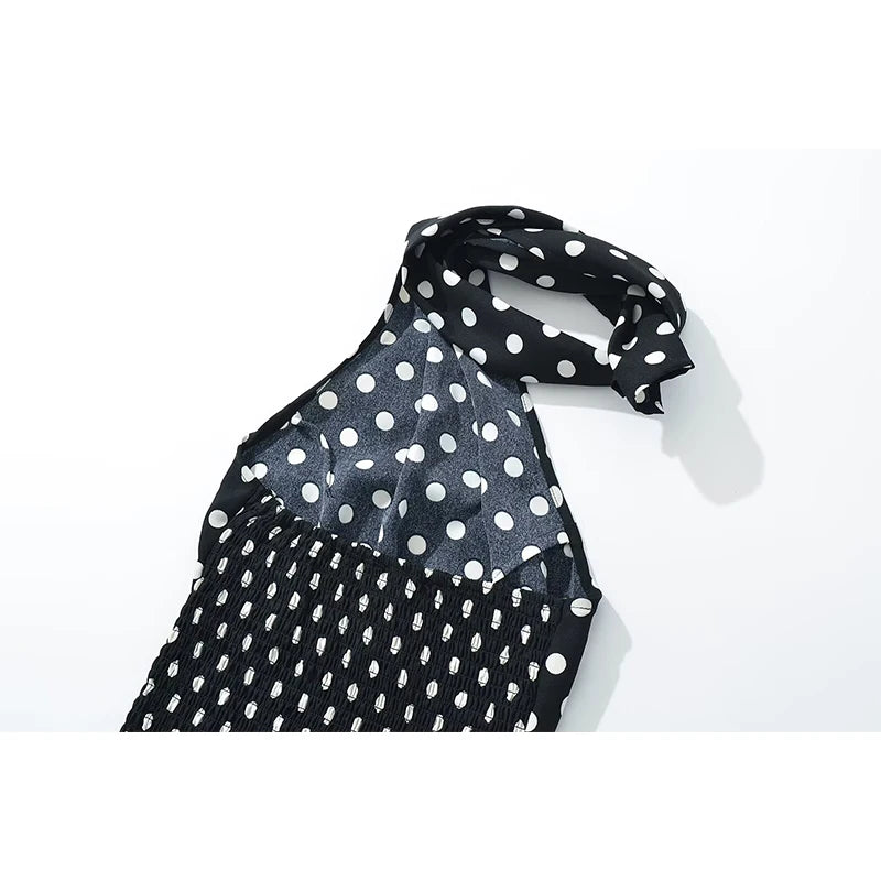 Black polka dot scarf on a white background