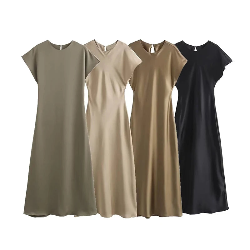 allvariants:: Four dresses in different colors on a white background
