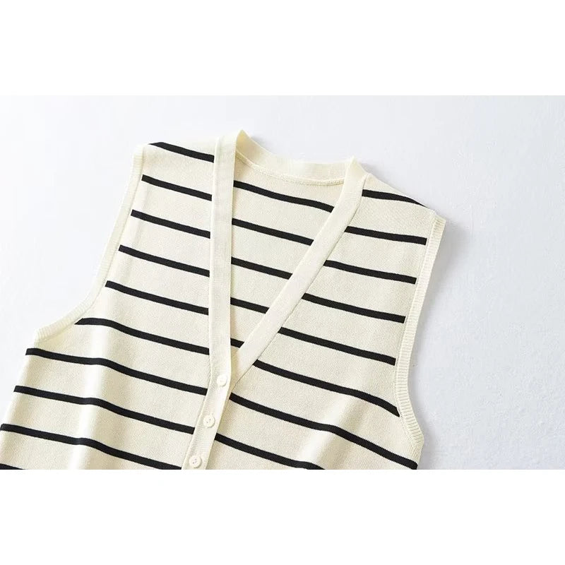 Striped::Striped shirt with black and white stripes on a light gray background