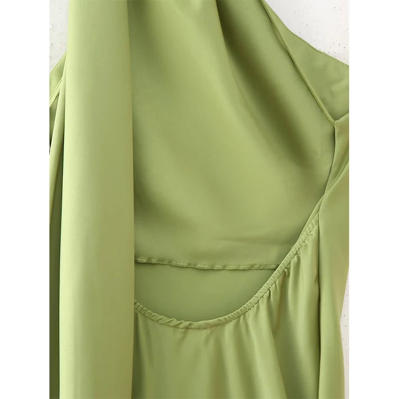 Green::Green sleeveless top on a white background