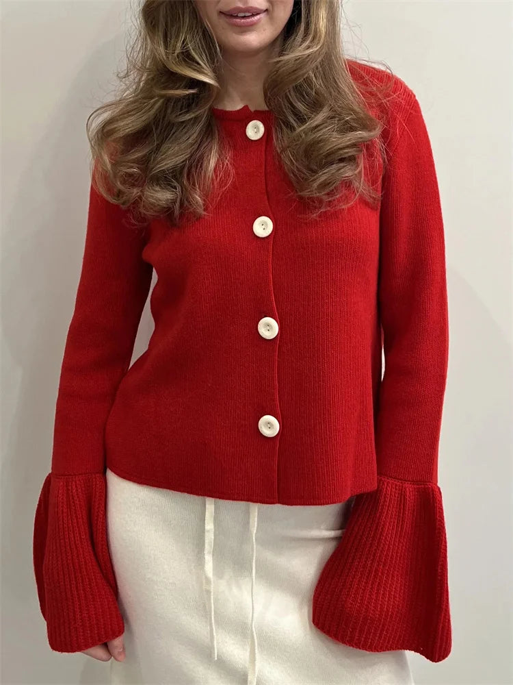 allvariants:: Red cardigan with bell sleeves worn by a person on a plain background