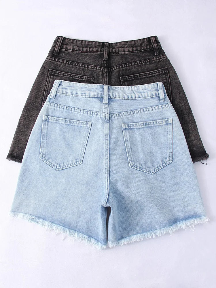 allvariants:: Light blue denim shorts with a black jacket on a white background