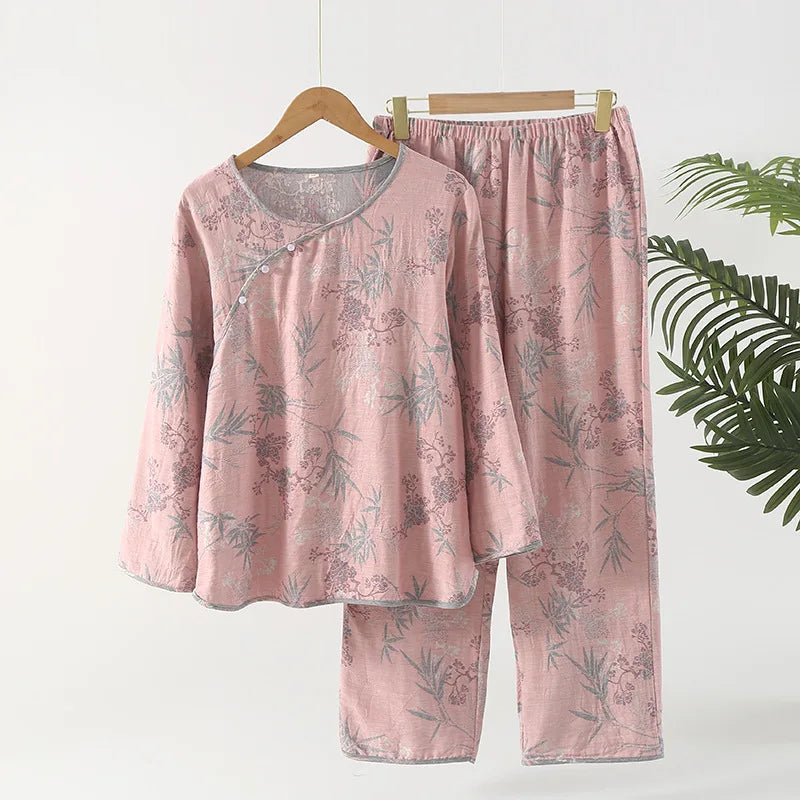 allvariants:: Pink floral pajama set on a hanger with a white background