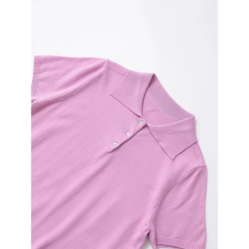 pink::Close-up of a pink polo shirt on a white background