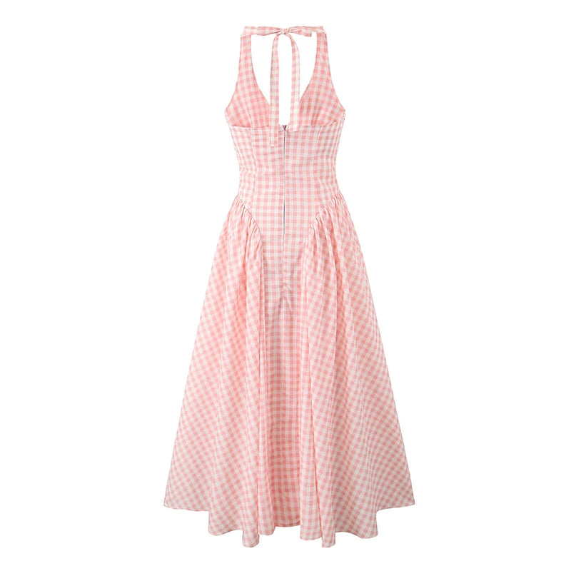 pink::Pink gingham dress on a white background