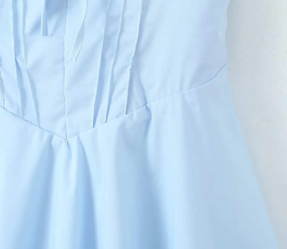 Close-up of light blue fabric texture