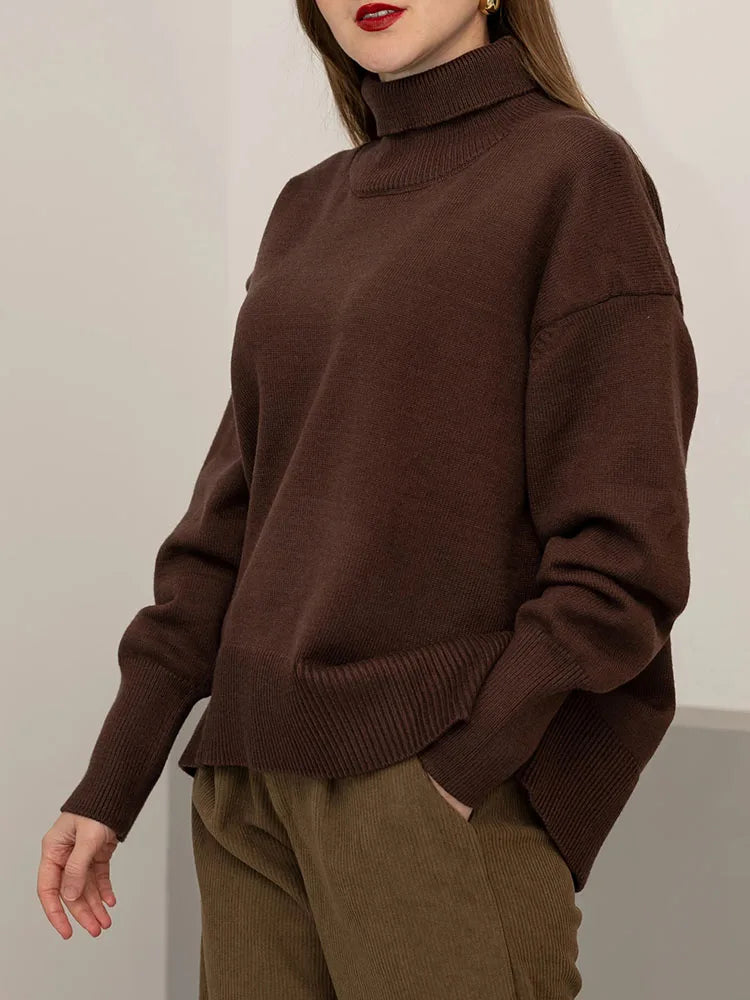 allvariants:: Person wearing a brown sweater and brown pants against a neutral background
