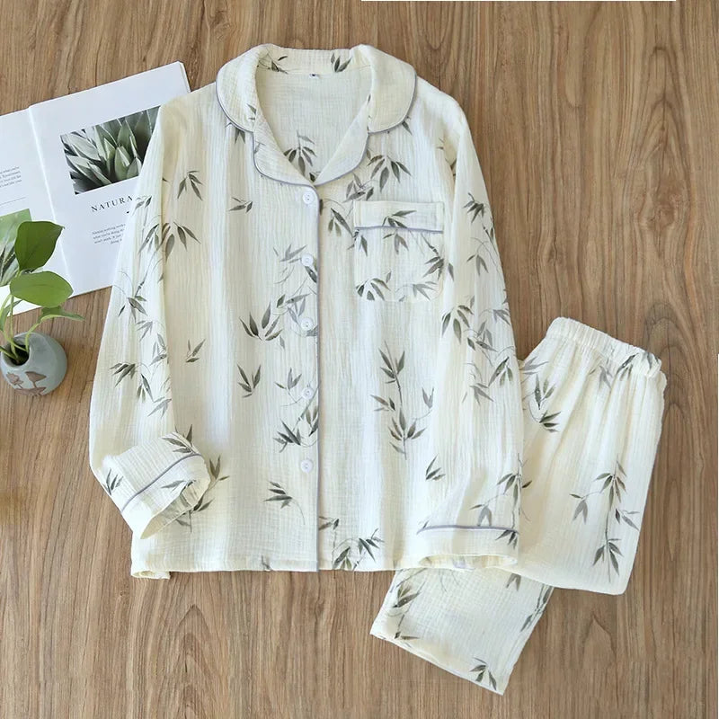 allvariants:: White pajama set with green leaf pattern on a wooden surface