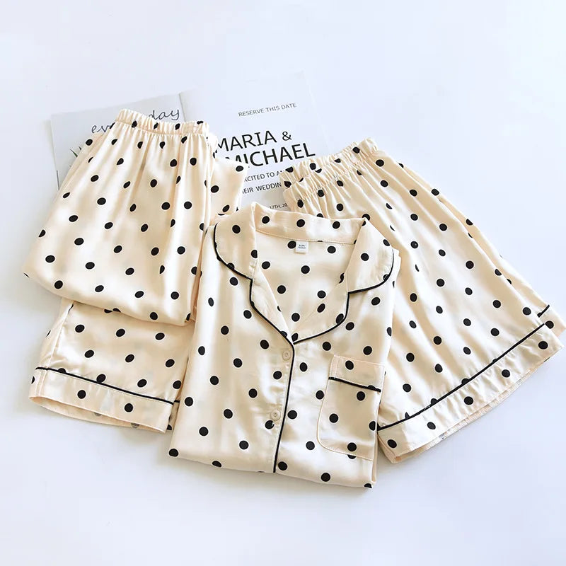 allvariants:: Beige pajama set with black polka dots on a white background