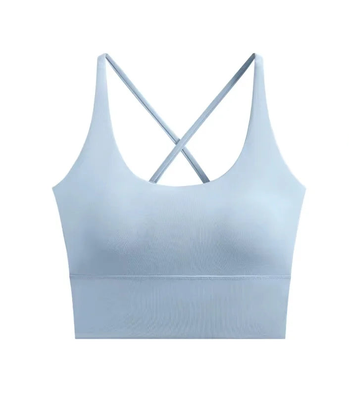 allvariants:: Light blue sports bra with criss-cross straps on a white background