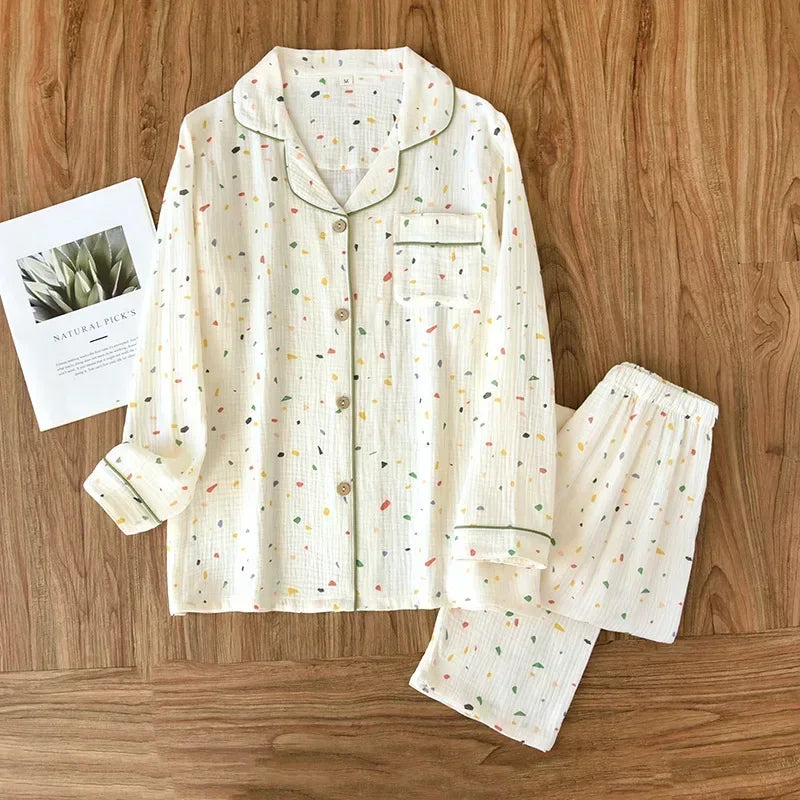 allvariants:: Floral-patterned pajama set on a wooden surface with a magazine.