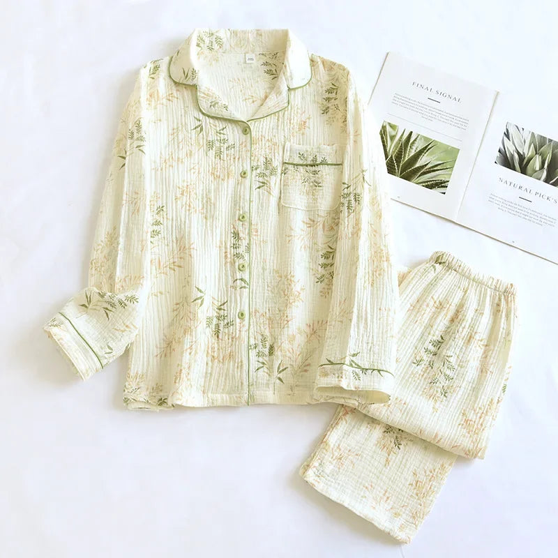 allvariants:: Floral pajama set on a white surface with a magazine.
