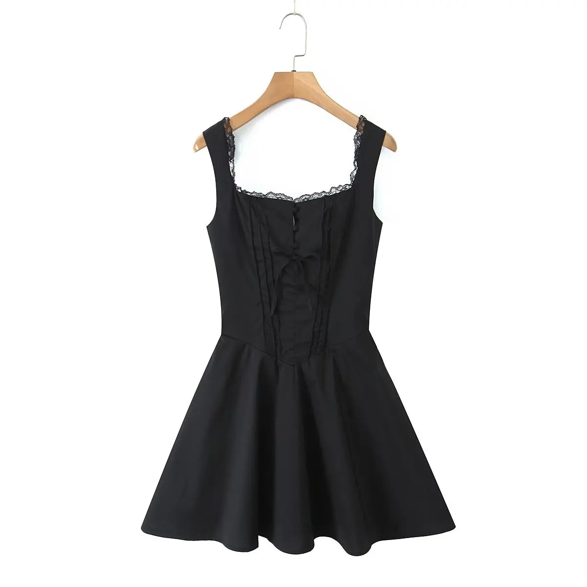 Black:: dress with lace details on a hanger against a white background